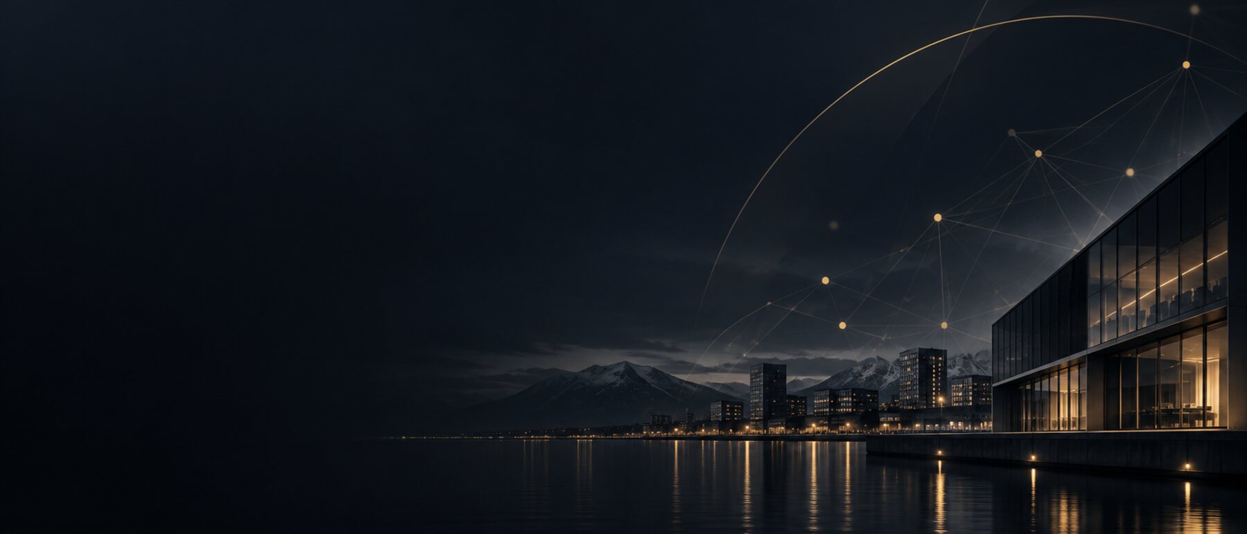 Modernes Bürogebäude bei Nacht am Wasser – Nordic Business, das Unternehmen von Stefan Brandenburg für Webdesign, Entwicklung und digitale Lösungen